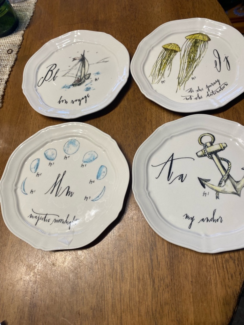 Anthropology set if 4 Linea Carta canapés plates. 6 3/4”. Excellent condition